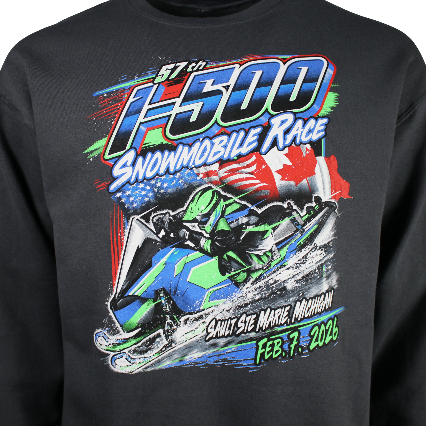 Close up of a snowmobile race graphic on the front of a sweatshirt with the text 'I-500 snowmobile Race, Sault Ste. Marie, Michigan, February 7th, 2026'.