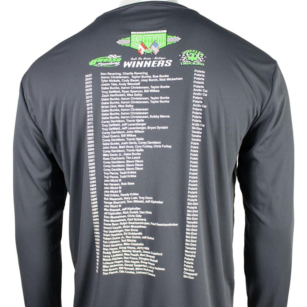 Close up of the back of a dark grey performance long sleeve with the I-500 snowmobile race winners listed.