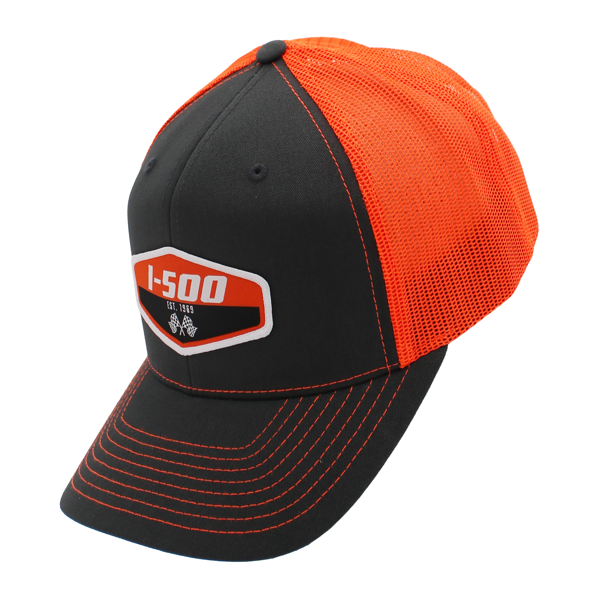 Side of a dark grey and orange cap with an orange and white I-500 patch on the front and orange stitching.
